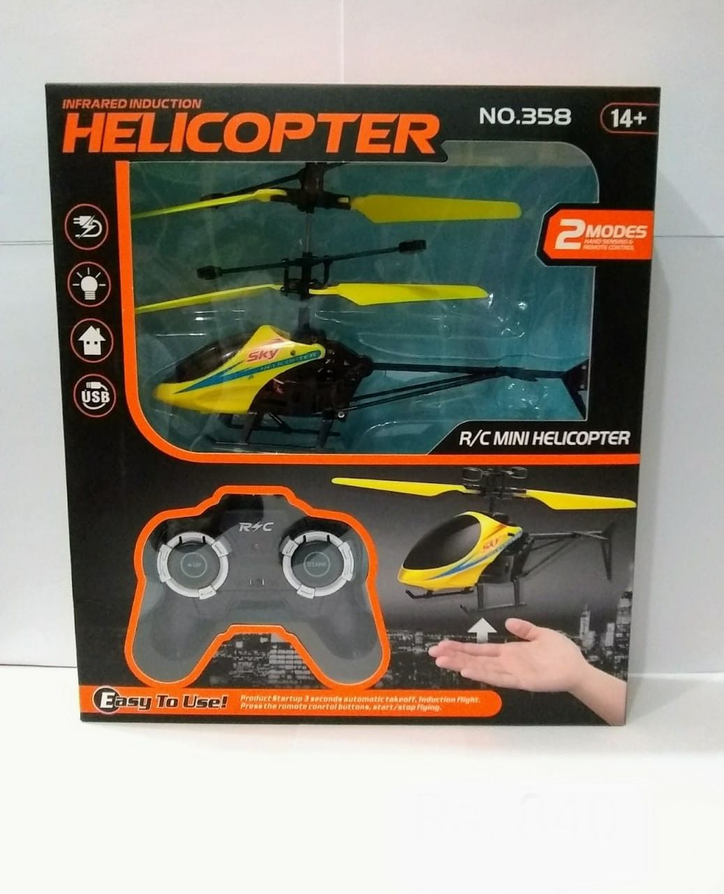 Remote control helicopter with hand induction